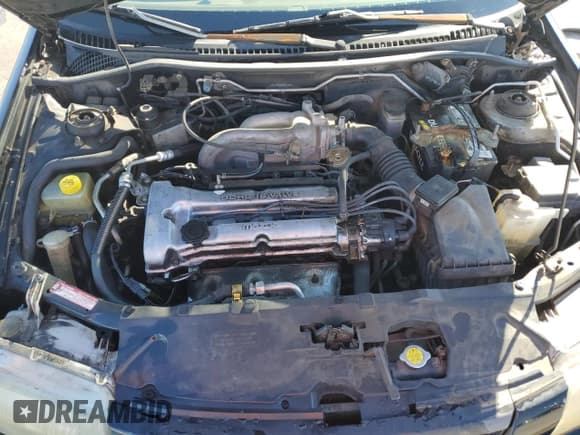 ✅ 1998 Mazda Protege DX • VIN: JM1BC1418W0207690 • Lot: 43252925. Listed on Copart with 143,614 mi. Free auction sales archive from the USA and detailed vehicle history report at DreamBid. Image 11.