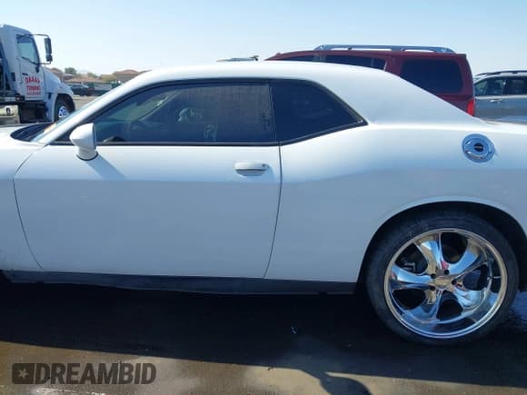 ✅ 2013 Dodge Challenger SXT • VIN: 2C3CDYAG3DH573945 • Lot: 41443472. Wystawiony na IAAI z przebiegiem 149 823 mil. Bezpłatny archiwum sprzedaży aukcyjnych z USA i szczegółowy raport historii pojazdu na DreamBid. Zdjęcie 14.