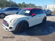 ✅ 2016 MINI Hardtop John Cooper Works • VIN: WMWXM9C52GT997913 • Lot: 43705175. Listed on IAAI with 148,898 mi. Free auction sales archive from the USA and detailed vehicle history report at DreamBid. Image 2.