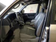 ✅ 2001 Toyota Land Cruiser • VIN: JTEHT05J412012973 • Lot: 69189805. Wystawiony na Copart z przebiegiem 247 373 mil. Bezpłatny archiwum sprzedaży aukcyjnych z USA i szczegółowy raport historii pojazdu na DreamBid. Zdjęcie 7.