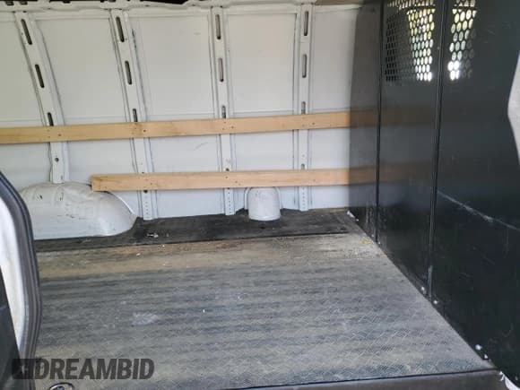 ✅ 2021 GMC Savana Cargo • VIN: 1GTW7AFP0M1203714 • Лот: 46957275. Опубликован ранее на Copart с пробегом 64 182 миль. Бесплатный доступ к архиву аукционных продаж из США и подробный отчёт об истории автомобиля на DreamBid. Изображение 11.