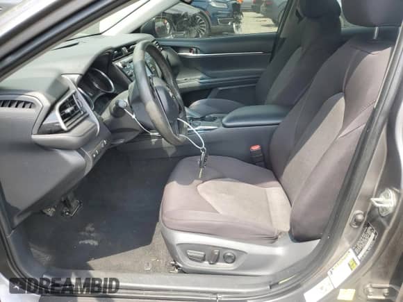 2019 Toyota Camry LE с VIN 4T1B11HK2KU159868, выставлен на аукционе Copart как лот 55486655 с пробегом 145 698 миль миль и Списание • Salvage title. История ставок и продаж доступна на DreamBid. Изображение 7.