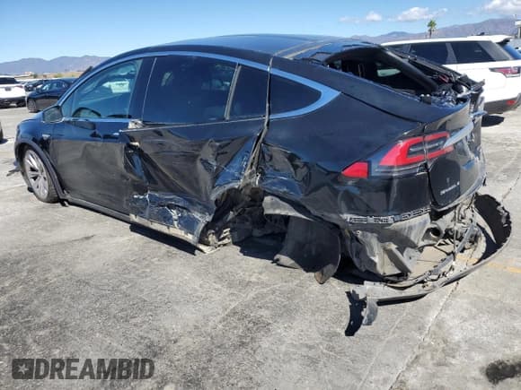 ✅ 2016 Tesla Model X P90D • VIN: 5YJXCAE48GF000699 • Лот: 86601935. Опубликован ранее на Copart с пробегом 171 774 миль. Бесплатный доступ к архиву аукционных продаж из США и подробный отчёт об истории автомобиля на DreamBid. Изображение 2.