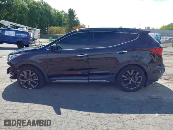 ✅ 2018 Hyundai Santa Fe Ultimate • VIN: 5XYZWDLA7JG508365 • Lot: 42994413. Listed on IAAI with 59,596 mi. Free auction sales archive from the USA and detailed vehicle history report at DreamBid. Image 15.