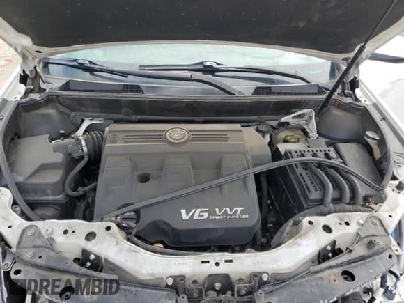 ✅ 2013 Cadillac SRX Performance Collection • VIN: 3GYFNHE36DS521908 • Lot: 65402415. Listed on Copart with 124,799 mi. Free auction sales archive from the USA and detailed vehicle history report at DreamBid. Image 12.