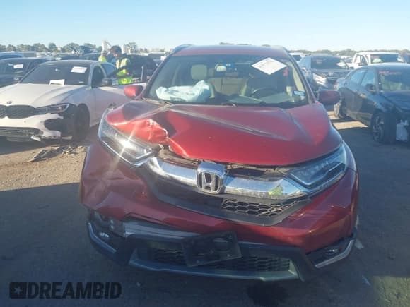 ✅ 2019 Honda CR-V Touring • VIN: 2HKRW1H94KH502563 • Lot: 43573536. Listed on IAAI with 42,050 mi. Free auction sales archive from the USA and detailed vehicle history report at DreamBid. Image 12.