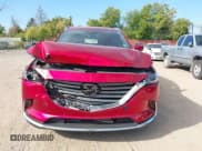 ✅ 2021 Mazda CX-9 Grand Touring • VIN: JM3TCBDY2M0524053 • Lot: 43450570. Listed on IAAI with 88,807 mi. Free auction sales archive from the USA and detailed vehicle history report at DreamBid. Image 12.