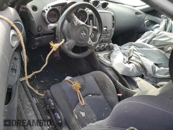 ✅ 2009 Nissan 370Z Touring • VIN: JN1AZ44E29M400562 • Лот: 81412635. Опубликован ранее на Copart с пробегом Не указан. Бесплатный доступ к архиву аукционных продаж из США и подробный отчёт об истории автомобиля на DreamBid. Изображение 8.