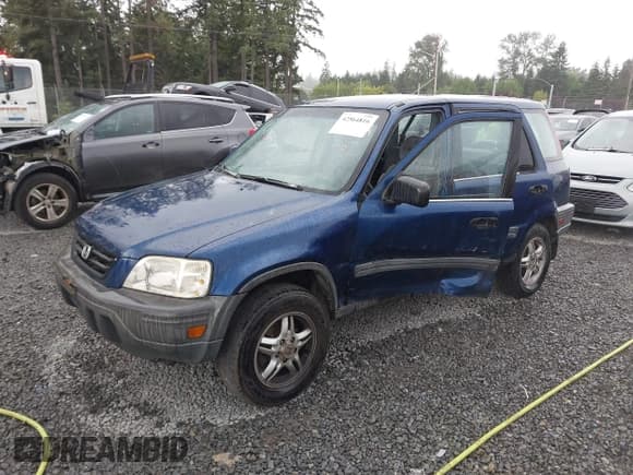 ✅ 1997 Honda CR-V • VIN: JHLRD1853VC061434 • Lot: 42564816. Listed on IAAI with 308,974 mi. Free auction sales archive from the USA and detailed vehicle history report at DreamBid. Image 2.