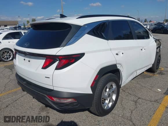 2024 Hyundai Tucson SEL with VIN 5NMJBCDE0RH322706, listed as a IAAI auction lot 43450594 with 47,508 mi miles and . Bid and sale history available at DreamBid. Image 4.