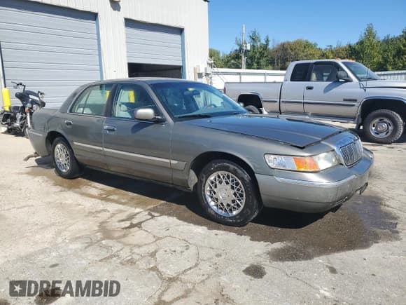 ✅ 1999 Mercury Grand Marquis GS • VIN: 2MEFM74W0XX624901 • Лот: 86463665. Опубликован ранее на Copart с пробегом 122 186 миль. Бесплатный доступ к архиву аукционных продаж из США и подробный отчёт об истории автомобиля на DreamBid. Изображение 4.