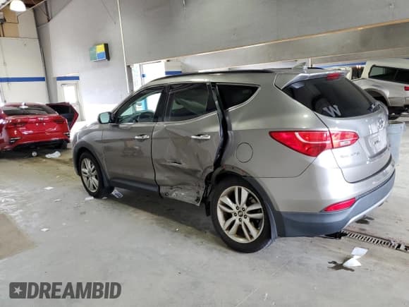 ✅ 2014 Hyundai Santa Fe • VIN: 5XYZU3LA6EG207690 • Лот: 63659934. Опубликован ранее на Copart с пробегом 76 843 миль. Бесплатный доступ к архиву аукционных продаж из США и подробный отчёт об истории автомобиля на DreamBid. Изображение 2.