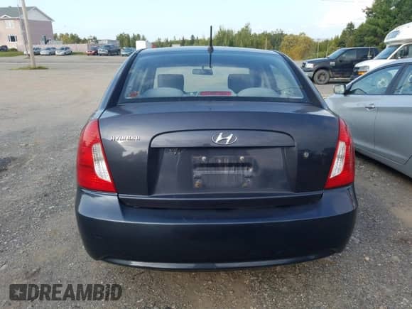 2011 Hyundai Accent GL с VIN KMHCN4BC6BU575529, выставлен на аукционе Copart как лот 71057904 с пробегом 239 554 миль миль и Списание • Salvage title. История ставок и продаж доступна на DreamBid. Изображение 6.