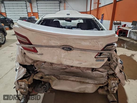 ✅ 2016 Ford Taurus SHO • VIN: 1FAHP2KT9GG118184 • Lot: 93997285. Listed on Copart with 231,488 mi. Free auction sales archive from the USA and detailed vehicle history report at DreamBid. Image 6.