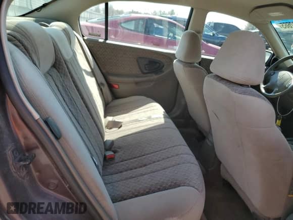 2000 Chevrolet Malibu z VIN 1G1ND52J0Y6194074, wystawiony jako Copart lot #49492665 z przebiegiem 116 214 mil mil oraz Szkoda całkowita • Salvage title. Historia ofert i sprzedaży dostępna na DreamBid. Obrazek 10.