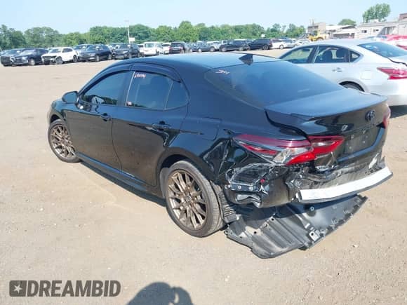 2023 Toyota Camry SE with VIN 4T1G11BKXPU097643, listed as a IAAI auction lot 42833306 with 23,580 mi miles and . Bid and sale history available at DreamBid. Image 3.