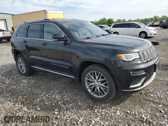 ✅ 2018 Jeep Grand Cherokee Summit • VIN: 1C4RJFJG1JC102524 • Lot: 54591835. Listed on Copart with 51,581 mi. Free auction sales archive from the USA and detailed vehicle history report at DreamBid. Image 4.