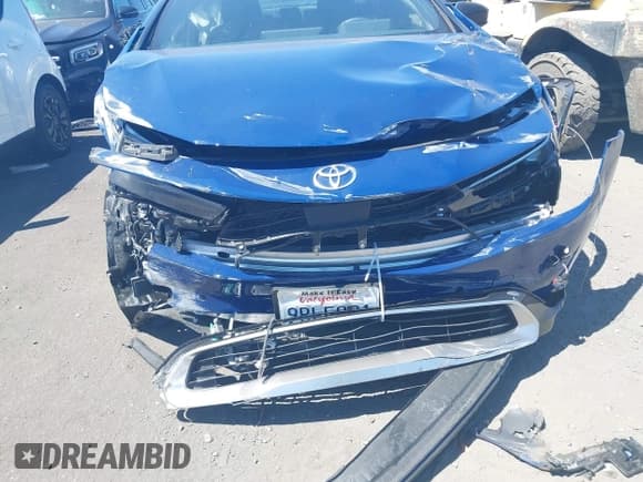 ✅ 2024 Toyota Prius SE • VIN: JTDACACU1R3032788 • Lot: 42823629. Listed on IAAI with 7,594 mi. Free auction sales archive from the USA and detailed vehicle history report at DreamBid. Image 6.