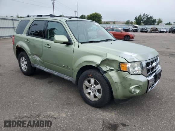 ✅ 2009 Ford Escape Hybrid • VIN: 1FMCU59359KB19042 • Lot: 71914005. Listed on Copart with 207,520 mi. Free auction sales archive from the USA and detailed vehicle history report at DreamBid. Image 4.
