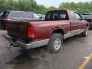 ✅ 2001 Dodge Dakota • VIN: 1B7GL22XX1S190262 • Lot: 42922639. Listed on IAAI with 142,990 mi. Free auction sales archive from the USA and detailed vehicle history report at DreamBid. Image 4.