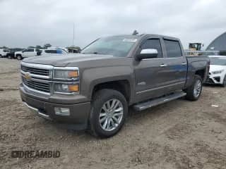 2015 Chevrolet Silverado 1500 High Country z VIN 3GCUKTEC7FG125274, wystawiony jako Copart lot #83803295 z przebiegiem 166 371 mil mil oraz Szkoda całkowita • Salvage title. Historia ofert i sprzedaży dostępna na DreamBid. Obrazek 1.