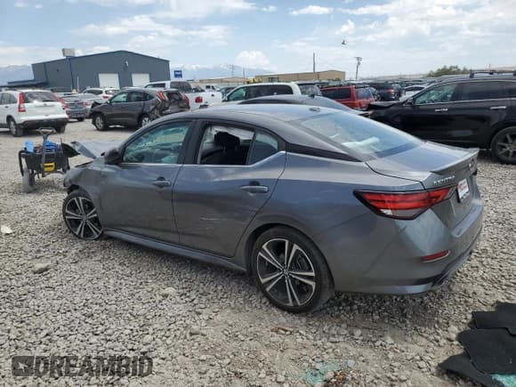 ✅ 2023 Nissan Sentra SR • VIN: 3N1AB8DV1PY238896 • Лот: 60670285. Опубликован ранее на Copart с пробегом 59 025 миль. Бесплатный доступ к архиву аукционных продаж из США и подробный отчёт об истории автомобиля на DreamBid. Изображение 2.