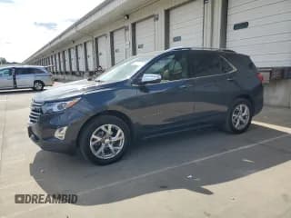 ✅ 2020 Chevrolet Equinox Premier • VIN: 2GNAXXEVXL6156479 • Лот: 70711305. Опубликован ранее на Copart с пробегом 114 844 миль. Бесплатный доступ к архиву аукционных продаж из США и подробный отчёт об истории автомобиля на DreamBid. Изображение 1.