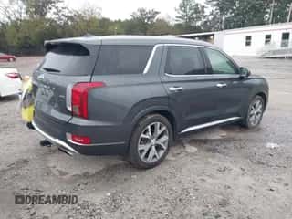 2021 Hyundai Palisade Limited z VIN KM8R5DHE5MU212760, wystawiony jako IAAI lot #43373056 z przebiegiem 70 526 mil mil oraz . Historia ofert i sprzedaży dostępna na DreamBid. Obrazek 4.