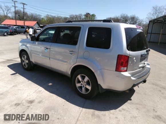 ✅ 2010 Honda Pilot EX-L • VIN: 5FNYF3H54AB006261 • Lot: 42009415. Listed on IAAI with 259,747 mi. Free auction sales archive from the USA and detailed vehicle history report at DreamBid. Image 3.