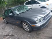 ✅ 2005 Jaguar XJ 8 LWB • VIN: SAJWA79C55SG39925 • Lot: 42427149. Listed on IAAI with 184,488 mi. Free auction sales archive from the USA and detailed vehicle history report at DreamBid. Image 1.