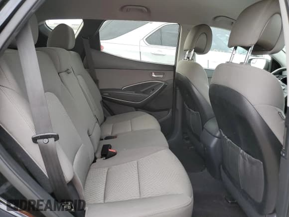 ✅ 2018 Hyundai Santa Fe 2.4L • VIN: 5NMZTDLB3JH077563 • Лот: 65330622. Опубликован ранее на Copart с пробегом 65 169 миль. Бесплатный доступ к архиву аукционных продаж из США и подробный отчёт об истории автомобиля на DreamBid. Изображение 11.