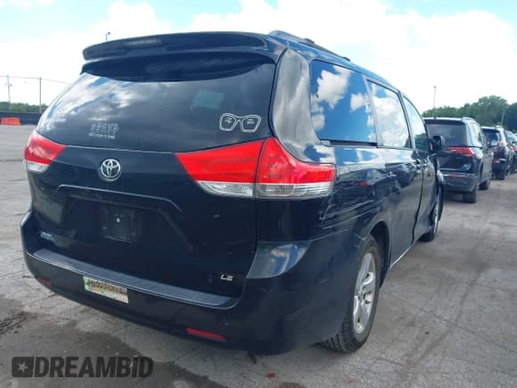 ✅ 2014 Toyota Sienna LE AAS • VIN: 5TDKK3DC4ES488897 • Lot: 43083441. Listed on IAAI with 127,469 mi. Free auction sales archive from the USA and detailed vehicle history report at DreamBid. Image 4.