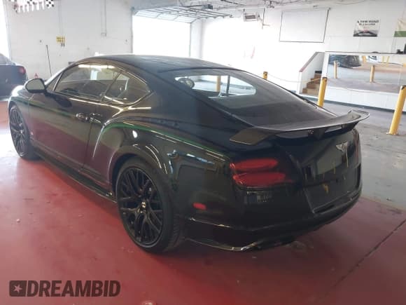 ✅ 2015 Bentley Continental GT • VIN: SCBFS8ZA9FC048427 • Lot: 43642438. Listed on IAAI with 14,022 mi. Free auction sales archive from the USA and detailed vehicle history report at DreamBid. Image 4.