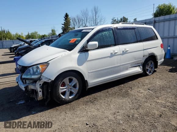 ✅ 2008 Honda Odyssey Touring • VIN: 5FNRL388X8B504840 • Лот: 57053205. Опубликован ранее на Copart с пробегом Не указан. Бесплатный доступ к архиву аукционных продаж из США и подробный отчёт об истории автомобиля на DreamBid. Изображение 1.