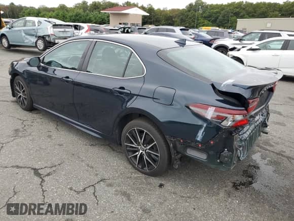 2021 Toyota Camry SE с VIN 4T1G11BK2MU035925, выставлен на аукционе Copart как лот 81007475 с пробегом 85 698 миль миль и Списание • Salvage title. История ставок и продаж доступна на DreamBid. Изображение 2.