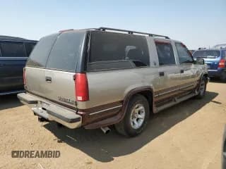 ✅ 1999 Chevrolet Suburban • VIN: 3GNEC16R2XG144591 • Lot: 65368364. Wystawiony na Copart z przebiegiem 244 605 mil. Bezpłatny archiwum sprzedaży aukcyjnych z USA i szczegółowy raport historii pojazdu na DreamBid. Zdjęcie 3.