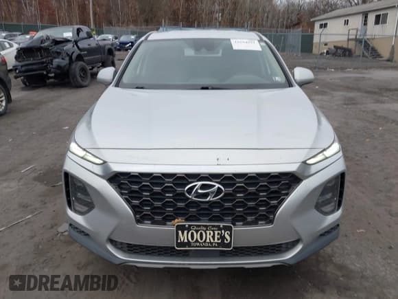✅ 2019 Hyundai Santa Fe SE • VIN: 5NMS2CAD7KH054274 • Lot: 43694931. Listed on IAAI with 96,329 mi. Free auction sales archive from the USA and detailed vehicle history report at DreamBid. Image 12.