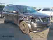 2018 Dodge Grand Caravan SXT z VIN 2C4RDGCG8JR159899, wystawiony jako IAAI lot #42837233 z przebiegiem 104 074 mil mil oraz . Historia ofert i sprzedaży dostępna na DreamBid. Obrazek 1.