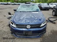 ✅ 2013 Volkswagen Jetta TDI w/Premium • VIN: 3VWLL7AJ6DM386508 • Lot: 57067455. Listed on Copart with 127,573 mi. Free auction sales archive from the USA and detailed vehicle history report at DreamBid. Image 5.