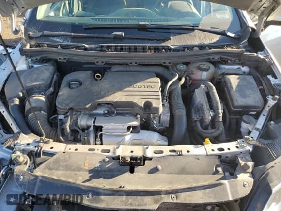 2018 Chevrolet Cruze LS z VIN 1G1BC5SMXJ7193305, wystawiony jako Copart lot #85277595 z przebiegiem 49 660 mil mil oraz Czysty tytuł • Clean title. Historia ofert i sprzedaży dostępna na DreamBid. Obrazek 11.