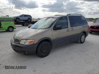 ✅ 2004 Pontiac Montana • VIN: 1GMDU03E64D113653 • Лот: 43993815. Опубликован ранее на Copart с пробегом 286 468 миль. Бесплатный доступ к архиву аукционных продаж из США и подробный отчёт об истории автомобиля на DreamBid. Изображение 1.
