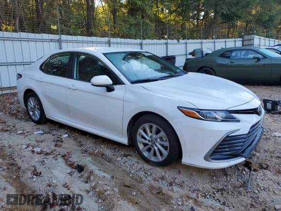 ✅ 2024 Toyota Camry LE • VIN: 4T1C11AK9RU864546 • Лот: 86251405. Опубликован ранее на Copart с пробегом 35 828 миль. Бесплатный доступ к архиву аукционных продаж из США и подробный отчёт об истории автомобиля на DreamBid. Изображение 4.