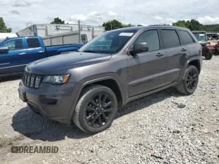 ✅ 2018 Jeep Grand Cherokee Altitude • VIN: 1C4RJFAG0JC203487 • Lot: 63159305. Listed on Copart with 119,385 mi. Free auction sales archive from the USA and detailed vehicle history report at DreamBid. Image 1.
