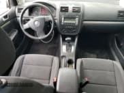 ✅ 2009 Volkswagen Rabbit S • VIN: WVWDA71K49W079965 • Лот: 55434955. Опубликован ранее на Copart с пробегом 140 529 миль. Бесплатный доступ к архиву аукционных продаж из США и подробный отчёт об истории автомобиля на DreamBid. Изображение 8.