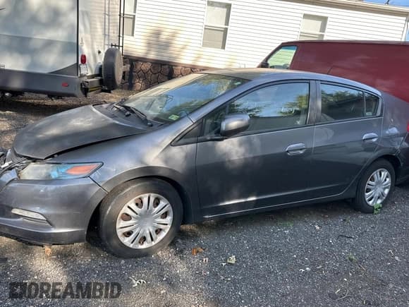 ✅ 2010 Honda Insight LX • VIN: JHMZE2H57AS034493 • Lot: 71323585. Wystawiony na Copart z przebiegiem 166 031 mil. Bezpłatny archiwum sprzedaży aukcyjnych z USA i szczegółowy raport historii pojazdu na DreamBid. Zdjęcie 2.