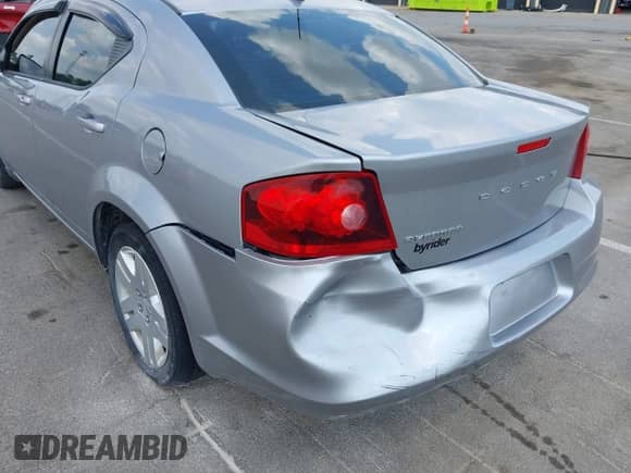 2013 Dodge Avenger SE with VIN 1C3CDZAB2DN540291, listed as a IAAI auction lot 42948168 with 148,169 mi miles and . Bid and sale history available at DreamBid. Image 6.