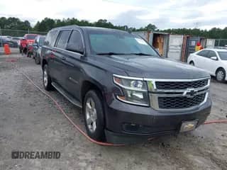 2015 Chevrolet Suburban LT z VIN 1GNSKJKC4FR226103, wystawiony jako IAAI lot #43371366 z przebiegiem 234 764 mil mil oraz . Historia ofert i sprzedaży dostępna na DreamBid. Obrazek 1.