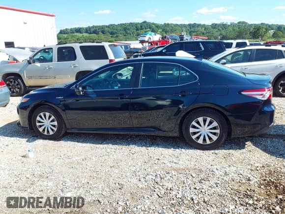 2020 Toyota Camry Hybrid LE z VIN 4T1E31AK9LU019478, wystawiony jako IAAI lot #43097201 z przebiegiem 48 313 mil mil oraz . Historia ofert i sprzedaży dostępna na DreamBid. Obrazek 14.