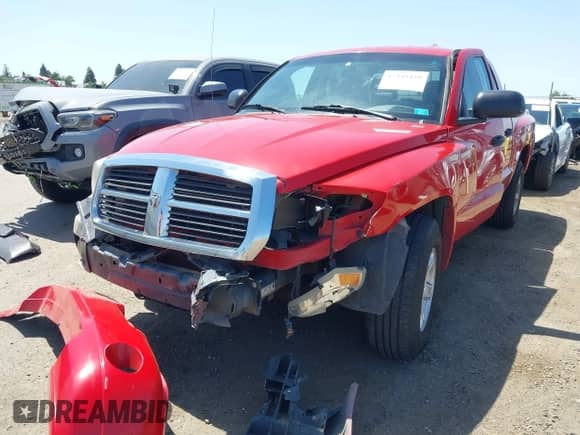 2006 Dodge Dakota SLT with VIN 1D7HE48NX6S588584, listed as a IAAI auction lot 42348429 with 246,965 mi miles and . Bid and sale history available at DreamBid. Image 2.