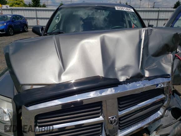 2007 Dodge Dakota SLT z VIN 1D7HW48KX7S256455, wystawiony jako Copart lot #62001464 z przebiegiem 109 239 mil mil oraz Szkoda całkowita • Salvage title. Historia ofert i sprzedaży dostępna na DreamBid. Obrazek 12.